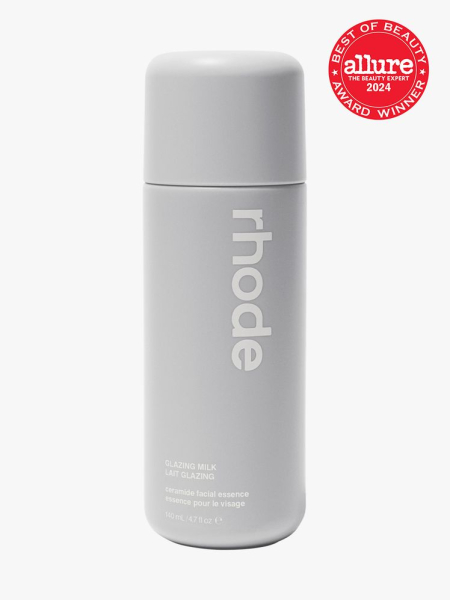 milky toner in branded gray bottle with cap on light gray background with red and white 2024 allure best of beauty seal